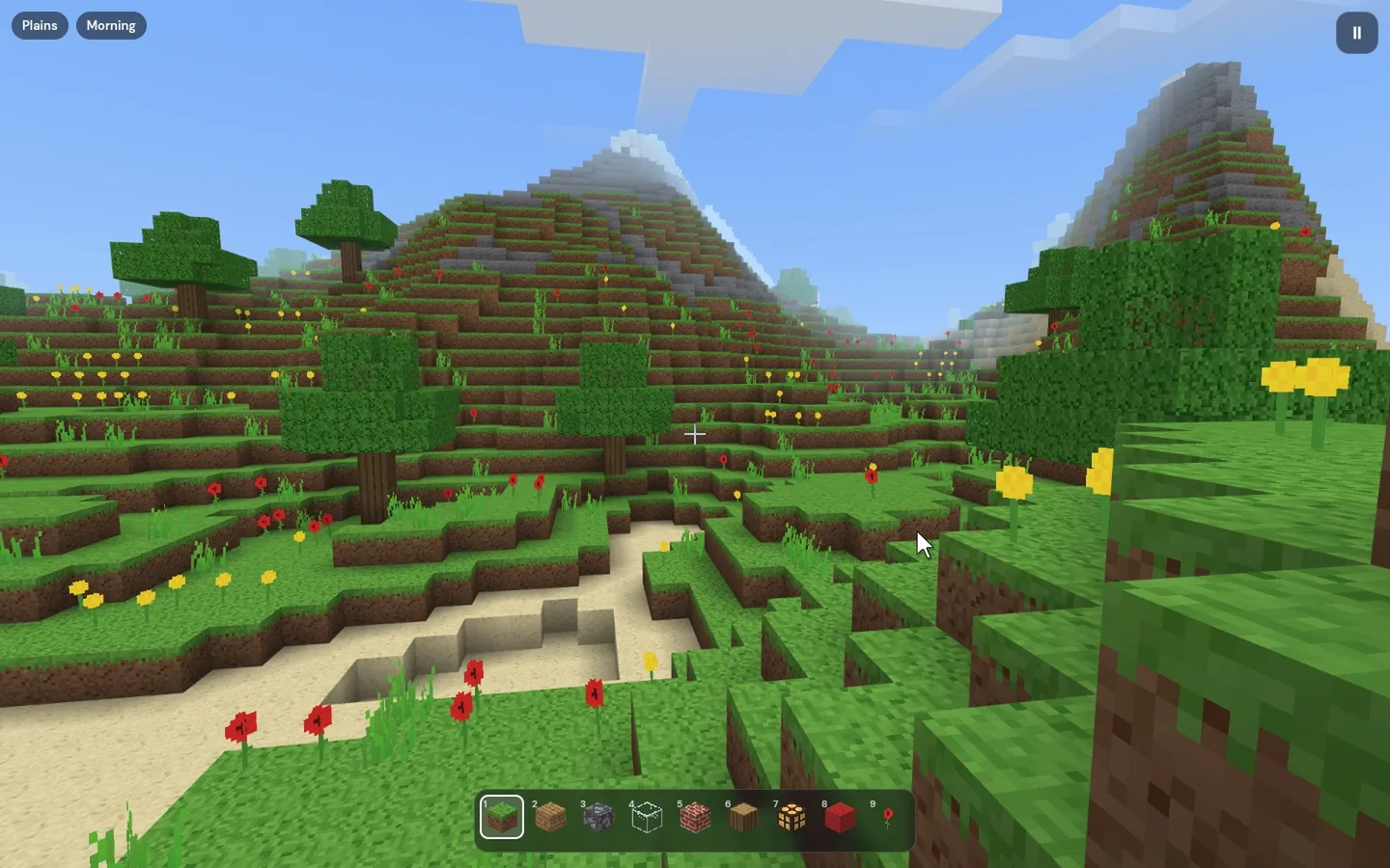 BlockCraft, a 3D block game: a terraced valley under a snowy peak, where a brick wall goes up block by block